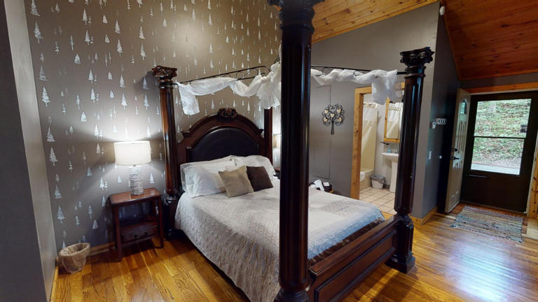 hocking hills cabins nestled away bed view