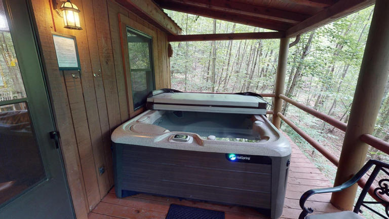 hocking hills cabins nestled away hot tub