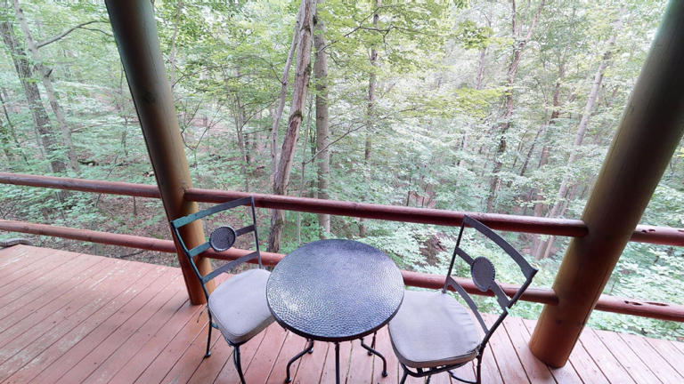 hocking hills cabins sweet seclusion table and chairs on deck